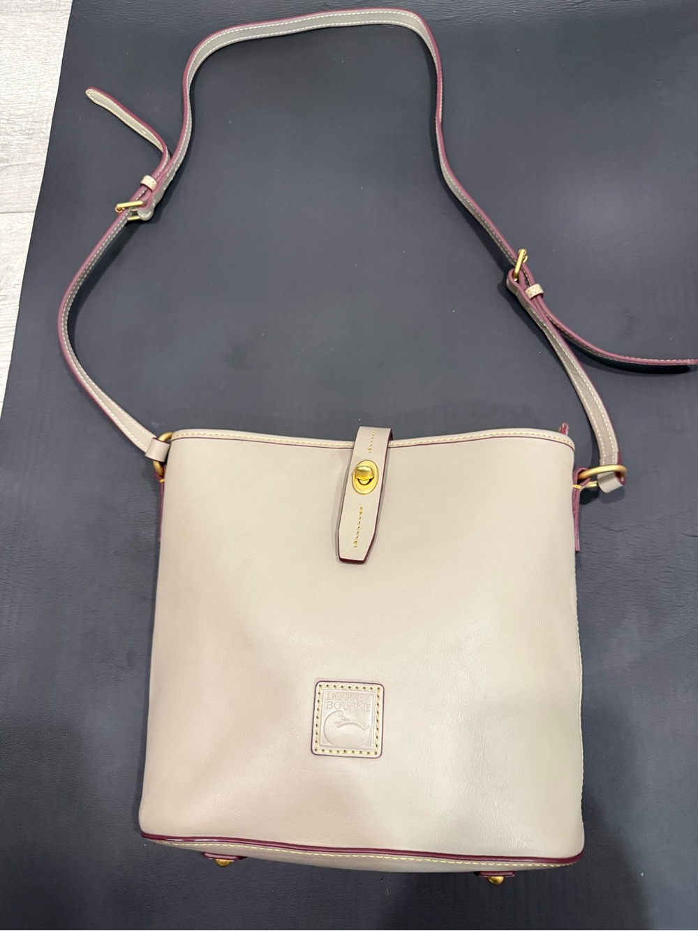 Dooney & Bourke Cream Leather Crossbody with Pink Trim